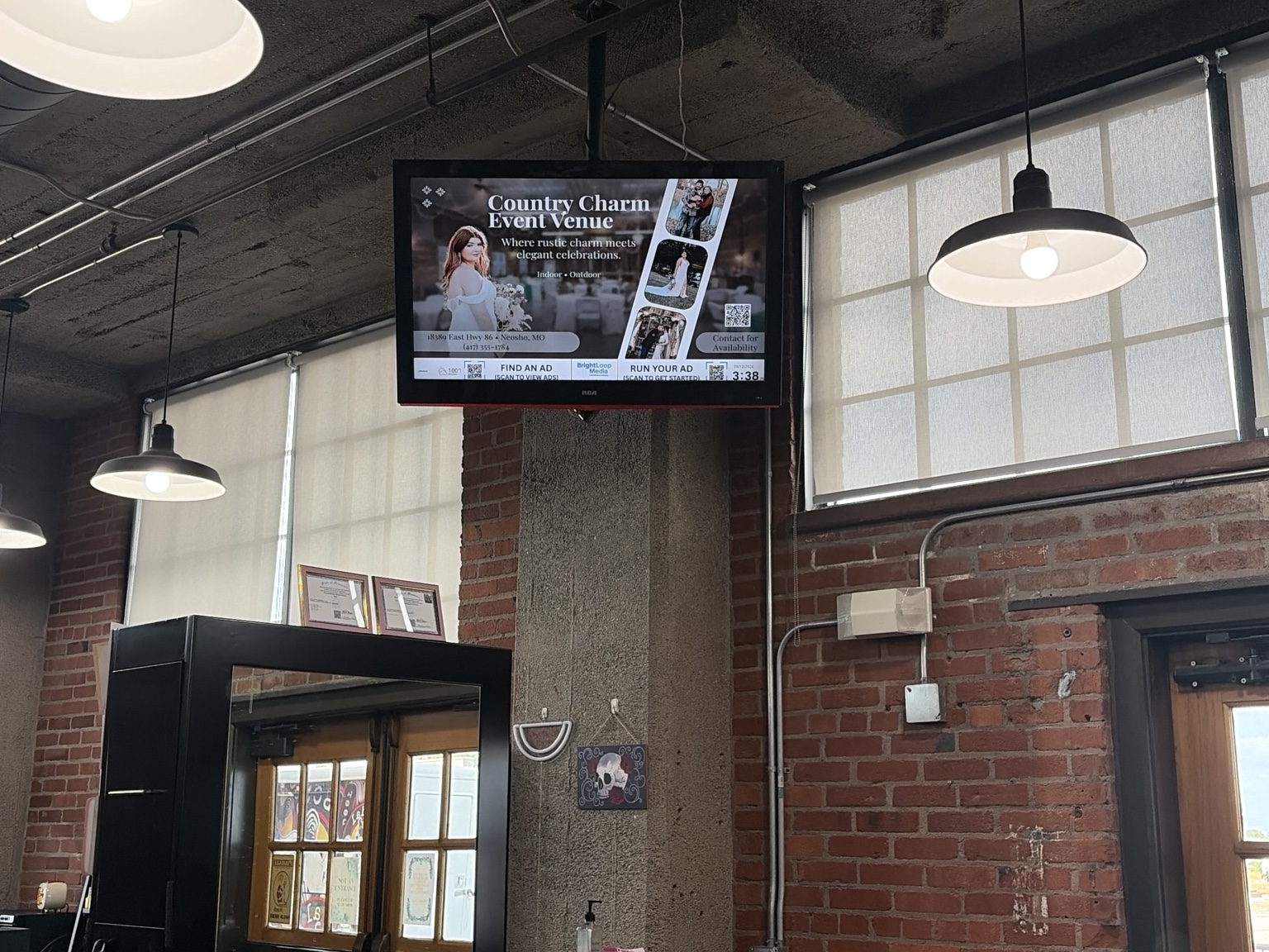 BrightLoop Media digital advertising screen inside a local hair salon