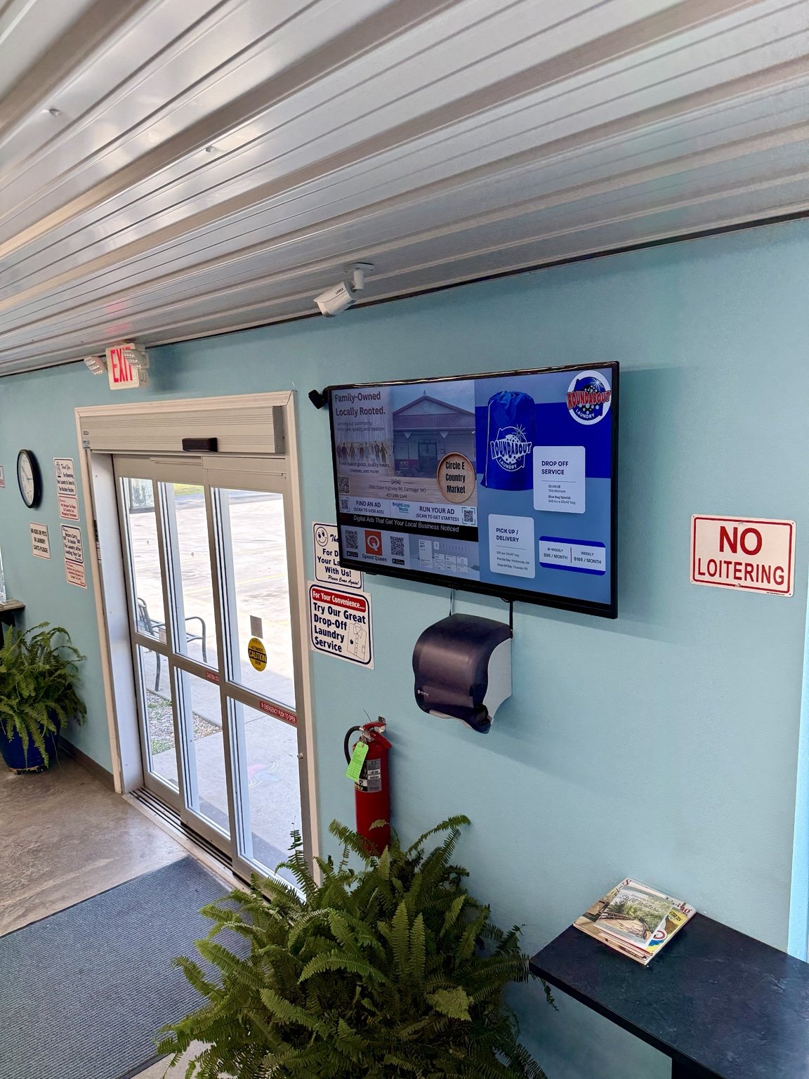 BrightLoop Media digital screen at Roundabout Laundry